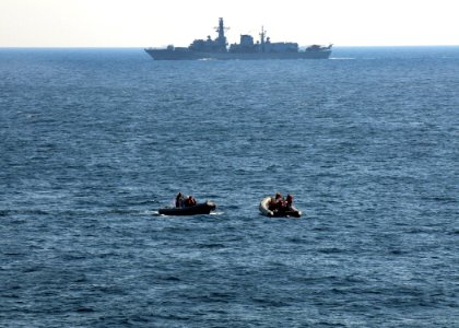 US Navy 091116-N-1291E-196 Members of Helicopter Mine Countermeasures Squadron (HM) 15 wait in rigid hull inflatable boats near the Royal Navy fleet auxiliary service landing ship dock RFA Lyme Bay (L3007)