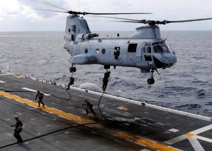 US Navy 091114-N-0120A-187 Marines assigned to the 31st Marine Expedition Unit (31st MEU) embarked aboard the USS Essex (LHD 2) conduct fast rope training from a CH-46E Sea Knight