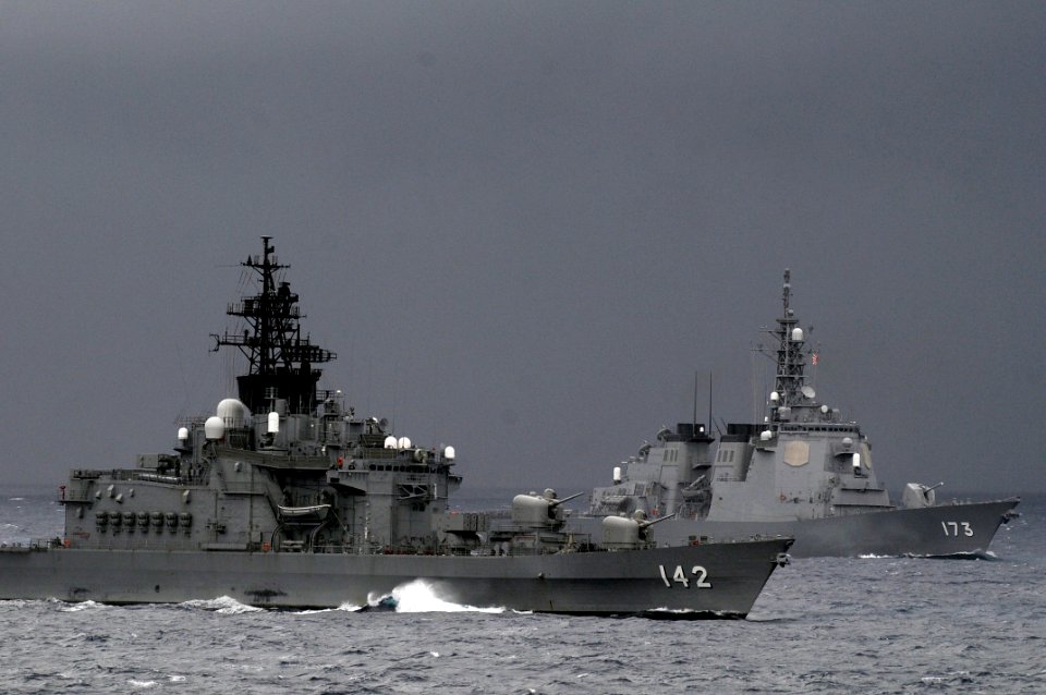 US Navy 091117-N-7280V-245 Japan Maritime Self-Defense Force destroyers JDS Hiei (DDH 142) and JDS Kongo (DDG 173) maneuver into formation during Annual Exercise (ANNUALEX 21G)