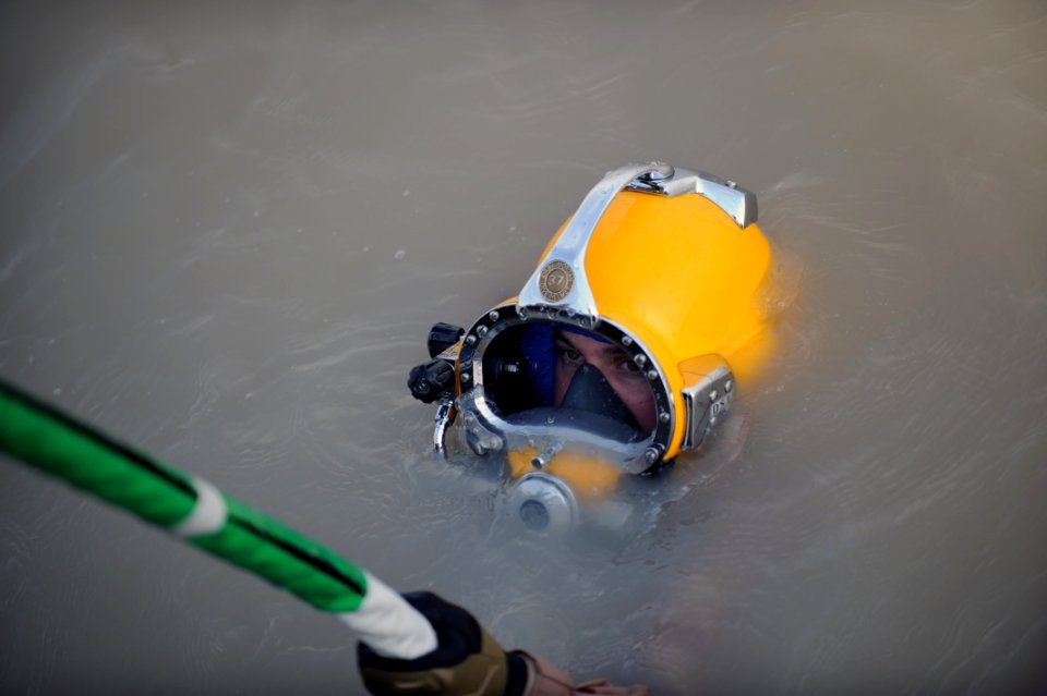 US Navy 091115-N-4154B-128 Navy Diver 2nd Class Zachery Dojaquez begins a dive during diving operations