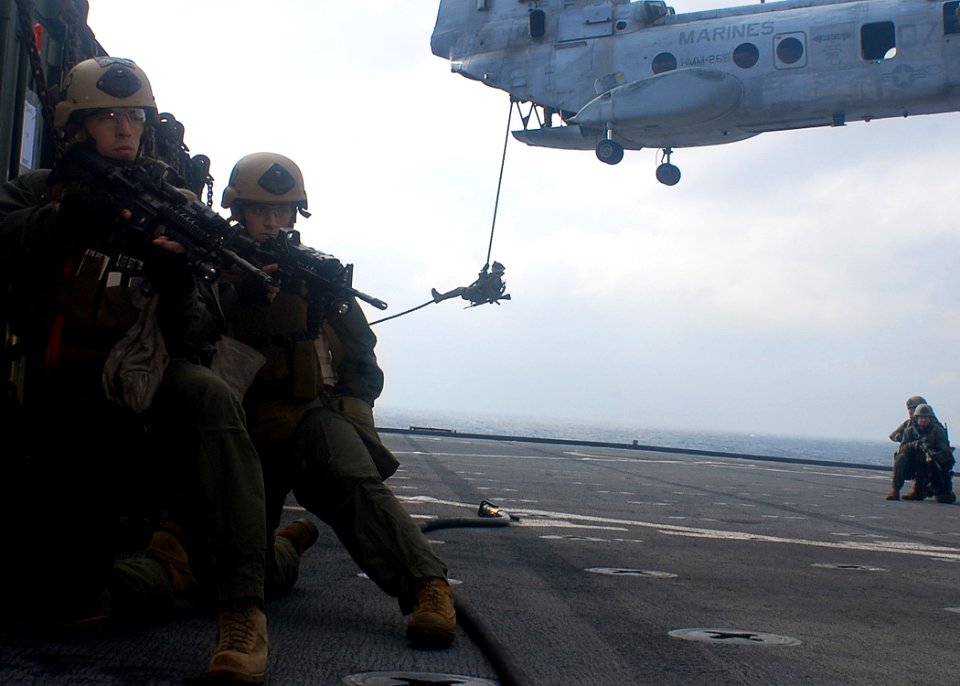US Navy 091116-N-6692A-048 Marine reconnaissance forces assigned to the 31st Marine Expeditionary Unit (31st MEU) secure a perimeter during a visit, board, search and seizure (VBSS) training exercise