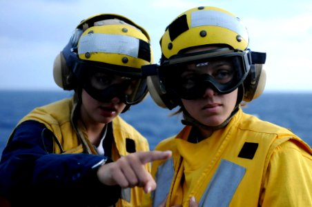 US Navy 091116-N-7478G-154 Boatswain's Mate 3rd Class Christine Bagley points out where the crash and salvage team stands to Boatswain's Mate 1st Class Danielle Villa