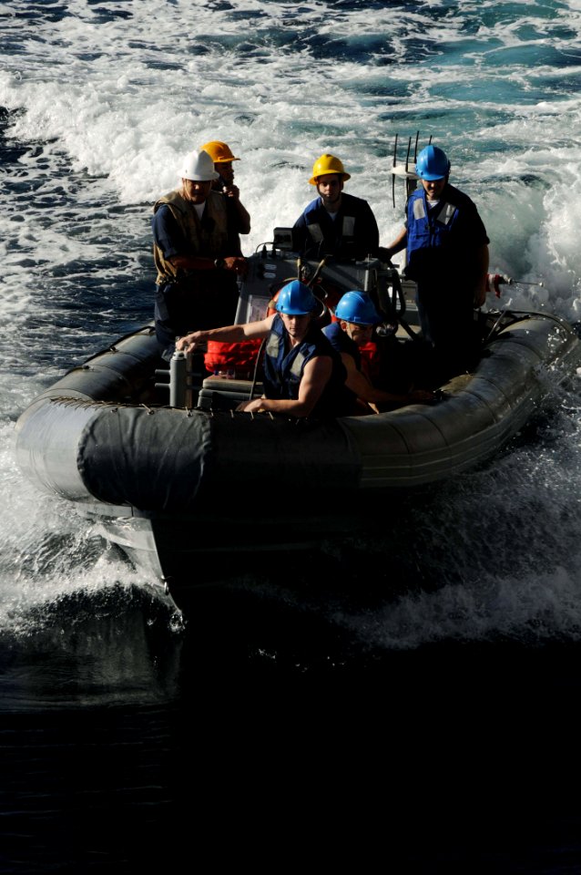 US Navy 091116-N-3038W-154 A rigid hull inflatable boat approaches the aircraft carrier USS Nimitz (CVN 68) during small boat operations