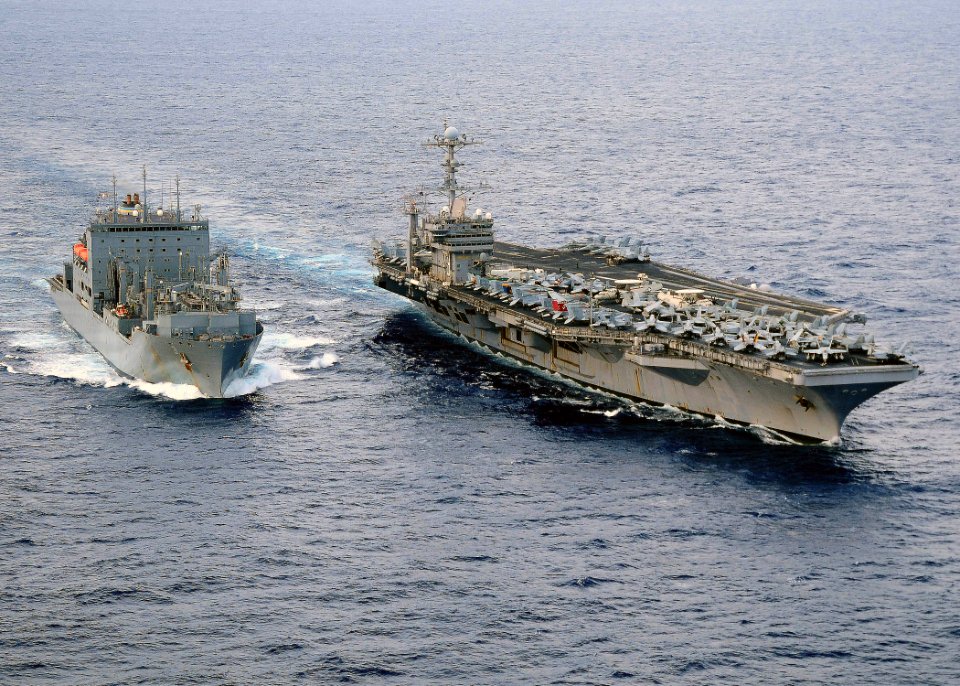 US Navy 091115-N-6720T-007 The Military Sealift Command dry cargo-ammunition ship USNS Alan B. Shepard (T-AKE 3), left, and the aircraft carrier USS George Washington (CVN 73) are underway together during a replenishment at sea