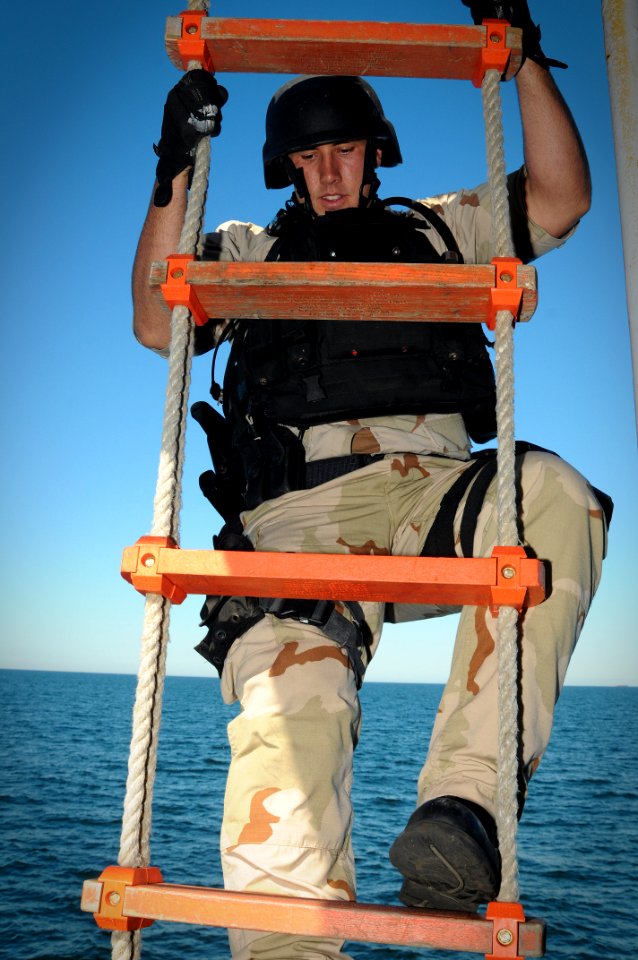 US Navy 091116-N-1522S-011 A Sailor climbs the Jacob's ladder during a visit, board, search and seizure exercise