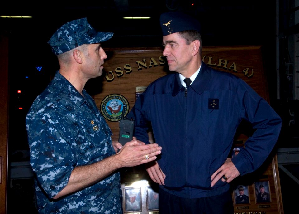 US Navy 091118-N-3592S-004 Capt. Ronald Reis, commanding officer of the amphibious assault ship USS Nassau (LHA 4), talks with French Air Force General Stephane Abrial, Supreme Allied Commander Transformation