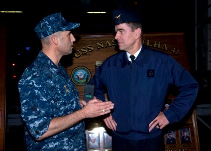 US Navy 091118-N-3592S-004 Capt. Ronald Reis, commanding officer of the amphibious assault ship USS Nassau (LHA 4), talks with French Air Force General Stephane Abrial, Supreme Allied Commander Transformation