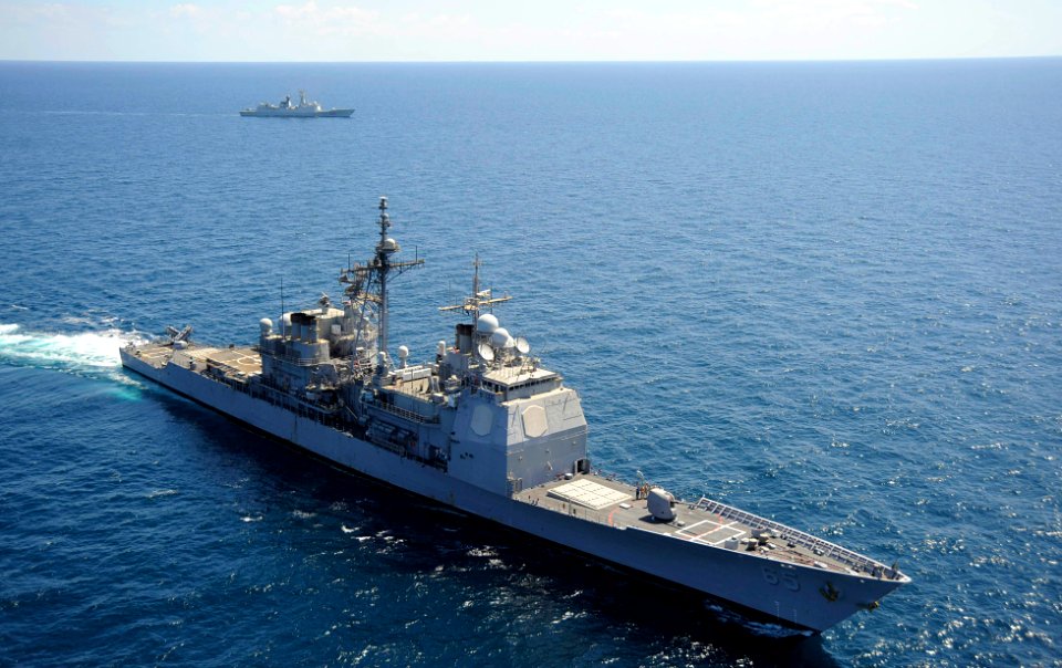 US Navy 091119-N-9500T-263 The guided-missile cruiser USS Chosin (CG 65) performs a breakaway maneuver from a formation with the People's Liberation Army-Navy frigate Zhoushan (FFG 529)