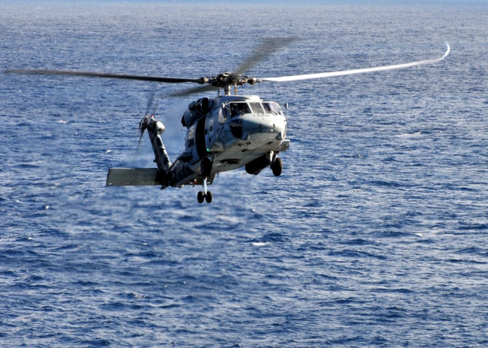 US Navy 091116-N-4236E-051 An SH-60F Sea Hawk helicopter prepares to land on the flight deck of USS Dwight D. Eisenhower (CVN 69)