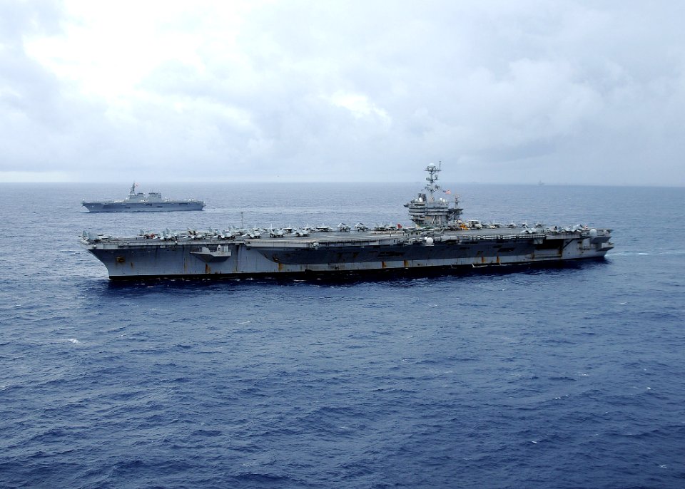 US Navy 091117-N-6720T-094 The aircraft carrier USS George Washington (CVN 73) and the Japan Maritime Self-Defense Force helicopter destroyer JS Hyuga (DDH 181) transit the Pacific Ocean