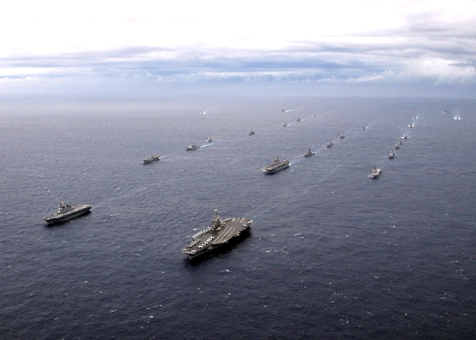 US Navy 091117-N-6233H-226 U.S. Navy and Japan Maritime Self-Defense Force ships transit in formation behind the aircraft carrier USS George Washington (CVN 73)