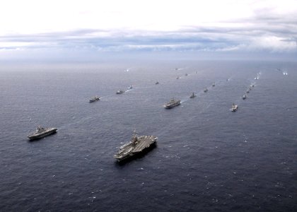 US Navy 091117-N-6233H-226 U.S. Navy and Japan Maritime Self-Defense Force ships transit in formation behind the aircraft carrier USS George Washington (CVN 73)