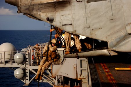 US Navy 091117-N-1590R-106 A Marine fast ropes from the back of a static CH-46E Sea Knight helicopter