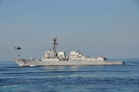 US Navy 091120-N-8421M-003 An MH-60S Sea Hawk helicopter assigned to the Wildcards of Helicopter Sea Combat Squadron (HSC) 23, delivers supplies to the guided-missile destroyer USS Sampson (DDG 102) during a replenishment as se