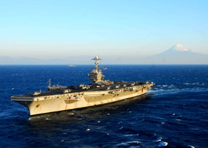 US Navy 091121-N-6720T-126 USS George Washington (CVN 73) transits the Pacific Ocean with Mt. Fuji in the background