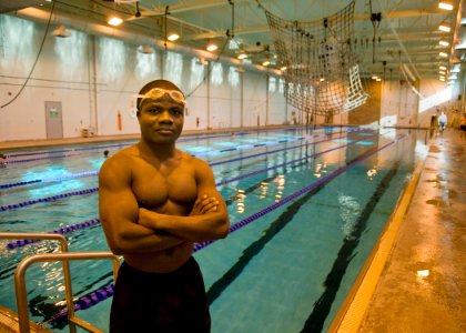 US Navy 091120-N-8689C-035 Engineman 2nd Class Wilmot Lloyd is training for an upcoming physical screening test as part of the Naval Special Warfare Aquatics Outreach Program at Joint Expeditionary Base, Little Creek photo