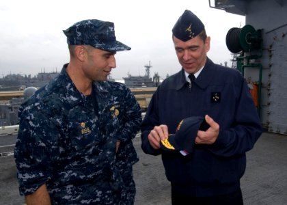 US Navy 091118-N-3592S-036 Capt. Ronald Reis, commanding officer of the amphibious assault ship USS Nassau (LHA 4), presents French Air Force General Stephane Abrial, Supreme Allied Commander Transformation