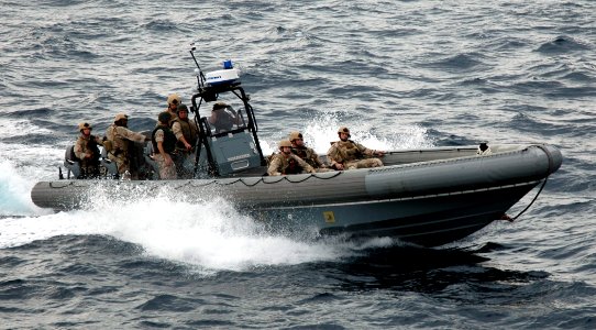 US Navy 091118-N-7058E-607 A visit, board, search, and seizure (VBSS) team from the littoral combat ship USS Freedom (LCS 1) takes part in a maritime intercept operation exercise
