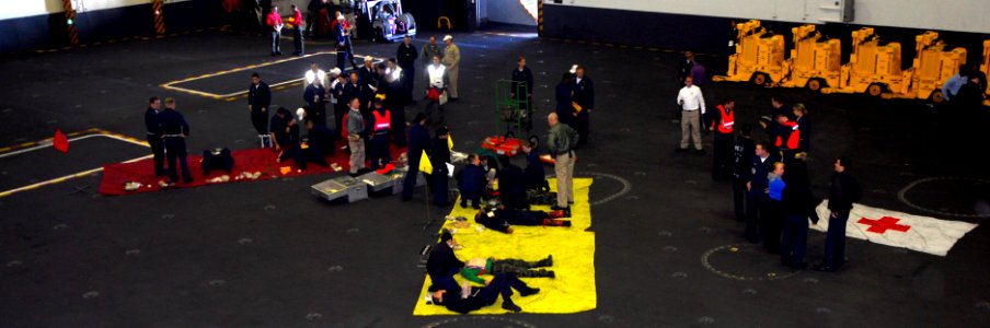 US Navy 091121-N-2475A-060 Medical training team members treat simulated casualties during a mass casualty drill