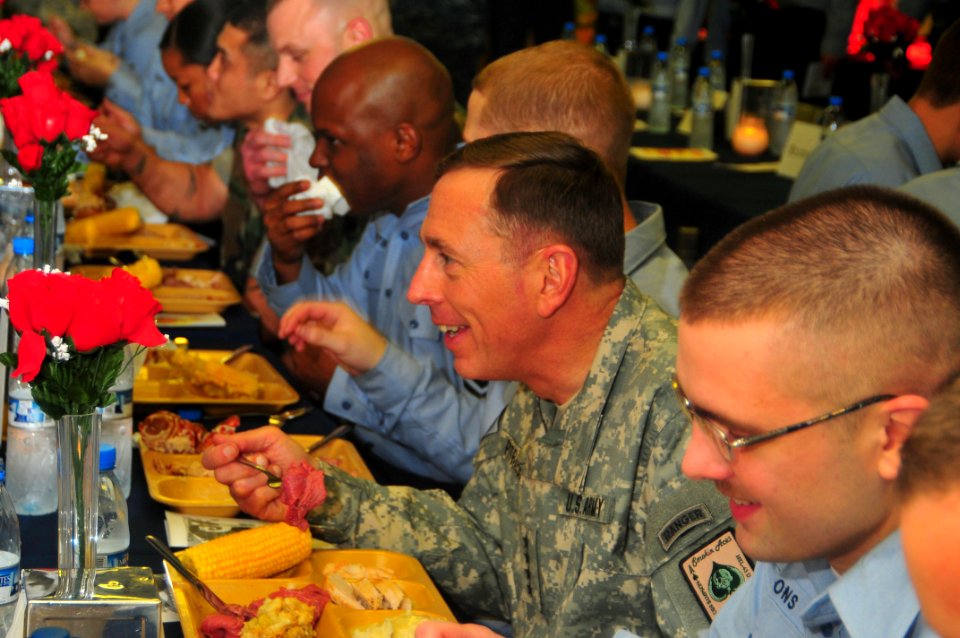 US Navy 091126-N-4053P-042 Gen. David H. Petraeus, commander, U.S. Central Command, eats Thanksgiving dinner with a group of Sailors aboard the aircraft carrier USS Nimitz (CVN 68)