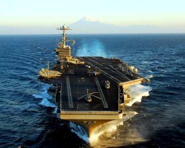 US Navy 091121-N-6720T-075 The aircraft carrier USS George Washington (CVN 73) is underway in the Pacific Ocean with Mt. Fuji in the background