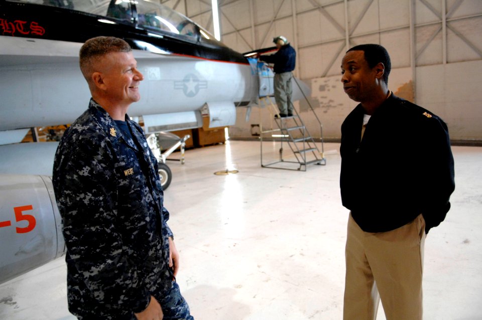 US Navy 091201-N-9818V-229 Master Chief Petty Officer of the Navy (MCPON) Rick West visits Sailors during a tour of the hangar spaces of Carrier Air Wing (CVW) 14 at Naval Air Station Lemoore