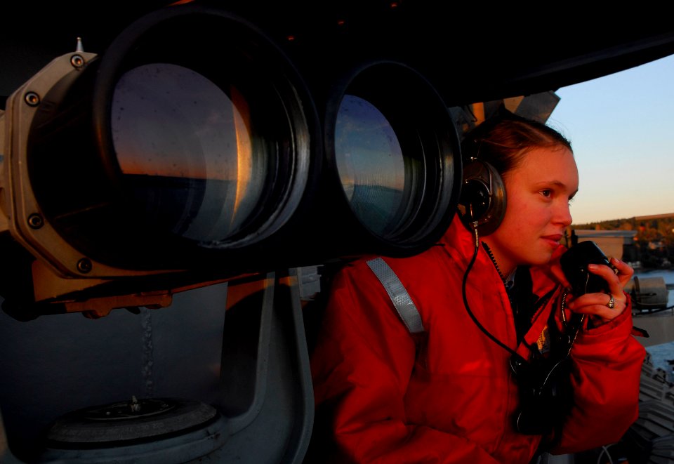 US Navy 091202-N-2475A-103 Quartermaster Seaman Britney Benigno, from Wichita Falls, Texas, stands the starboard bearing watch as the aircraft carrier USS John C. Stennis (CVN 74) pulls out of its homeport