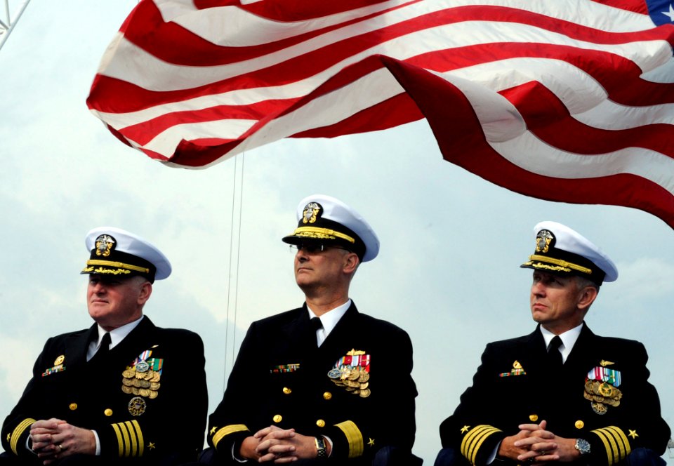 US Navy 091124-N-7478G-330 Capt. Rudy Lupton, prospective commanding officer of the U.S. 7th Fleet command ship USS Blue Ridge (LCC 19), Rear Adm. Richard B. Landolt, commander of Amphibious Force U.S. 7th Fleet