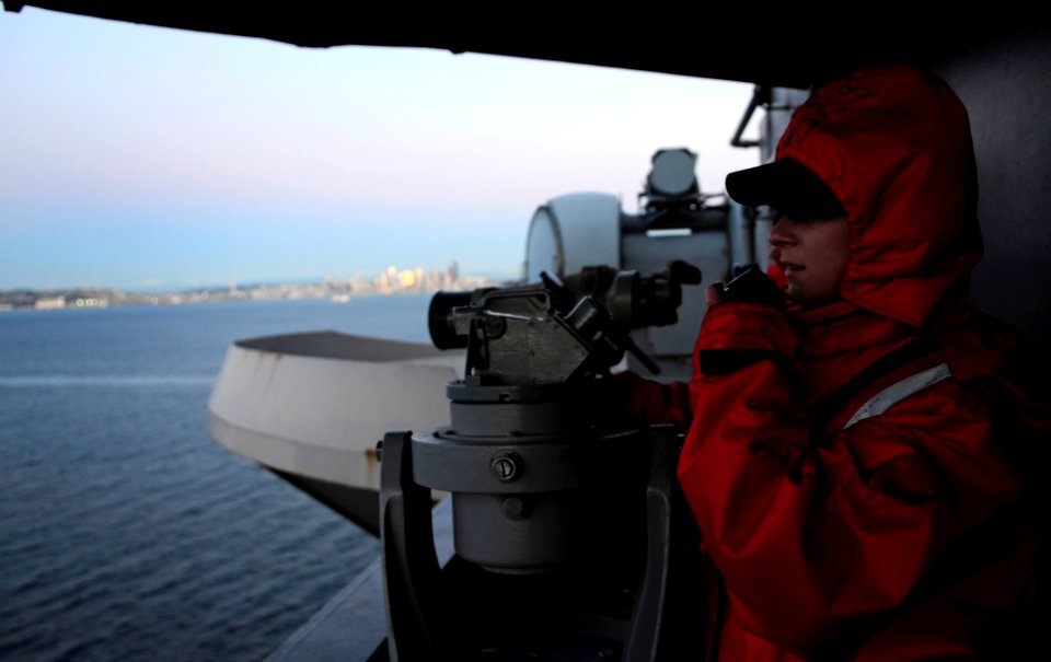 US Navy 091202-N-9928E-111 Quartermaster 3rd Class Jessa Suthann mans a sound-powered phone on the signal bridge of USS John C. Stennis (CVN 74)