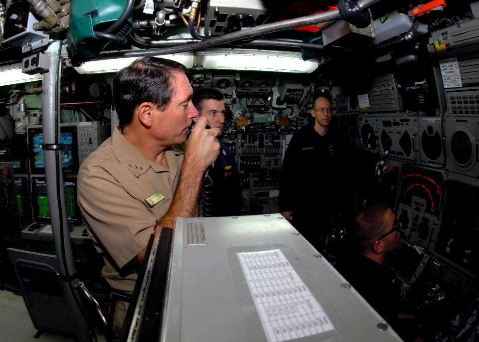 US Navy 091125-N-7705S-096 Vice Adm. Jay Donnelly, commander, Submarine Force, congratulates the crew of the Los Angeles-class attack submarine USS Montpelier (SSN 765) over the ship's 1MC
