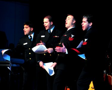 US Navy 091204-N-5508A-159 Members of the Navy Sea Chanters sing their comedy version of