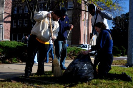 US Navy 091204-N-8907D-032 Sailors rake leaves during Clean the Station Day photo