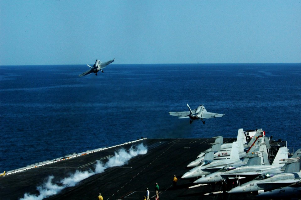 US Navy 091207-N-3327M-086 Two F-A-18 Hornets launch from the aircraft carrier USS Nimitz (CVN 68)