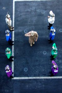 US Navy 091206-N-3327M-081 Rainbow side boys render honors to arriving Maj. Gen. Stephen L. Hoog, Deputy Combined Force Air Component Commander, U.S. Central Command, aboard the aircraft carrier USS Nimitz (CVN 68)