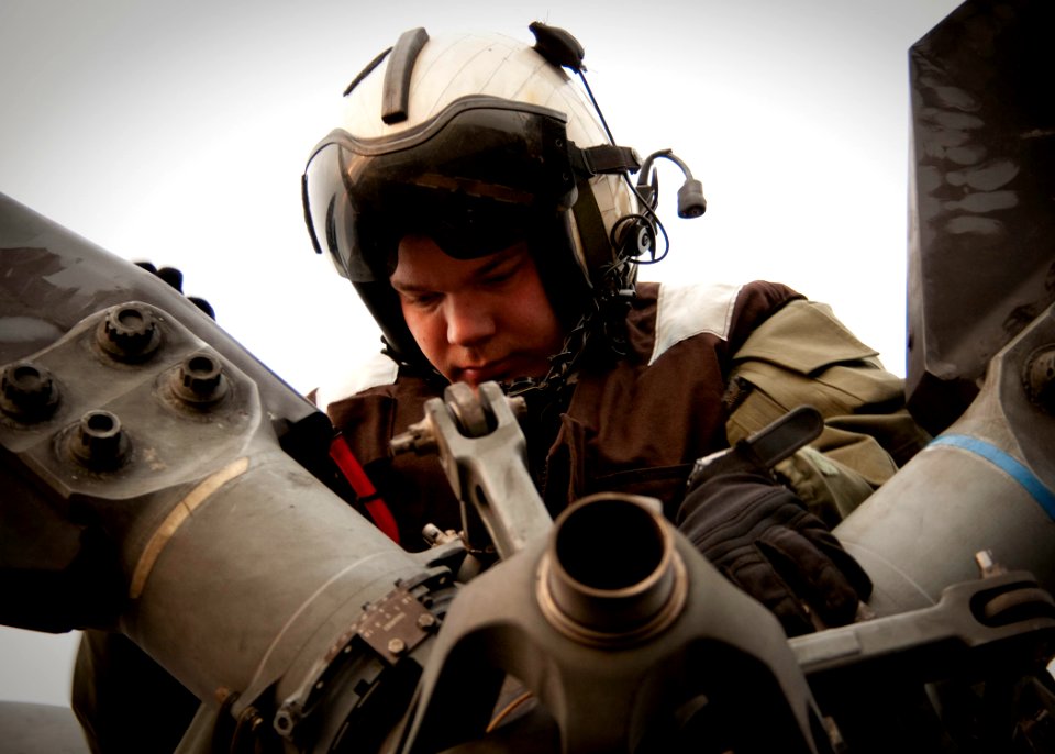 US Navy 091206-N-5712P-022 Cpl. Devan LeBlanc nspects a tail rotor during flight quarters aboard the amphibious assault ship USS Nassau (LHA 4)