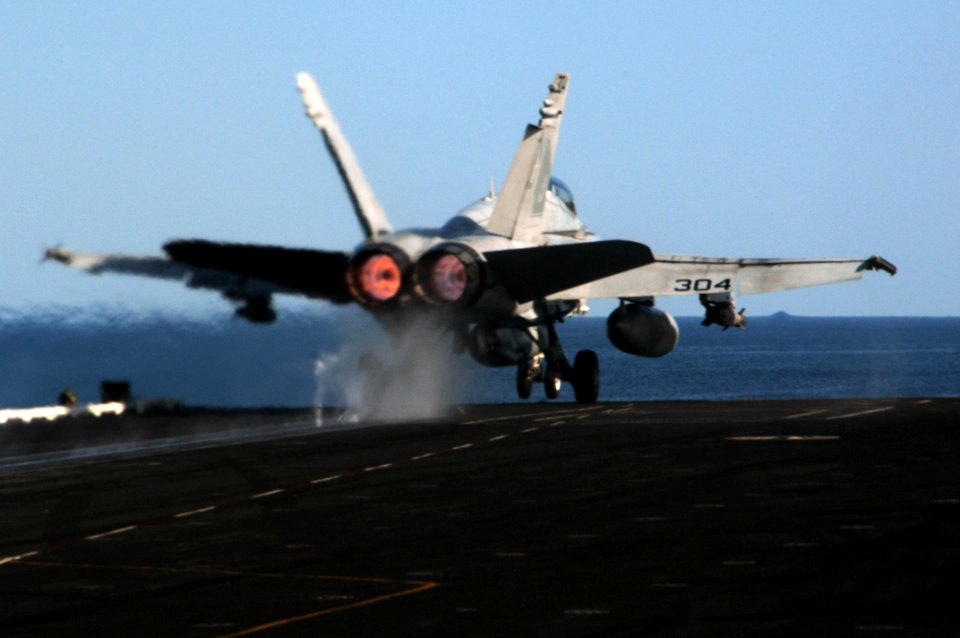 US Navy 091207-N-3038W-437 An F-A-18C Hornet assigned to the Warhawks of Strike Fighter Squadron (VFA) 97 launches from the aircraft carrier USS Nimitz (CVN 68)