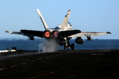 US Navy 091207-N-3038W-437 An F-A-18C Hornet assigned to the Warhawks of Strike Fighter Squadron (VFA) 97 launches from the aircraft carrier USS Nimitz (CVN 68)