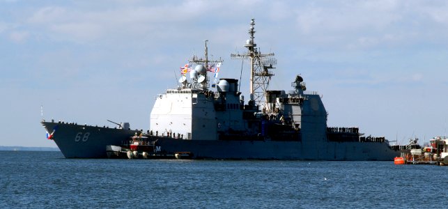 US Navy 091204-N-2456S-010 The Ticonderoga-class guided-missile cruiser USS Anzio (CG 68) returns to Naval Station Norfolk after completing a six-month deployment in the U.S. 5th and 6th Fleet areas of responsibility photo