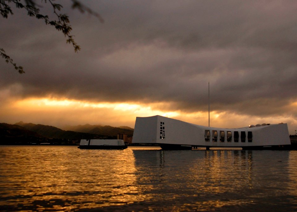US Navy 091207-N-8539M-373 The sun rises over the USS Arizona Memorial on the 68th anniversary of the attck on Pearl Harbor