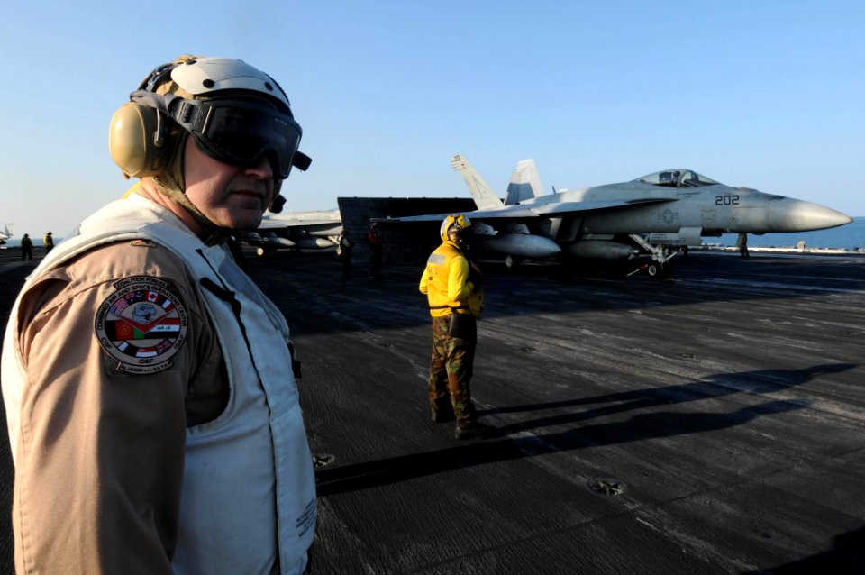 US Navy 091207-N-3038W-693 Maj. Gen. Stephen L. Hoog, Deputy Combined Force Air Component Commander, U.S. Central Command observes flight operations aboard the aircraft carrier USS Nimitz (CVN 68)