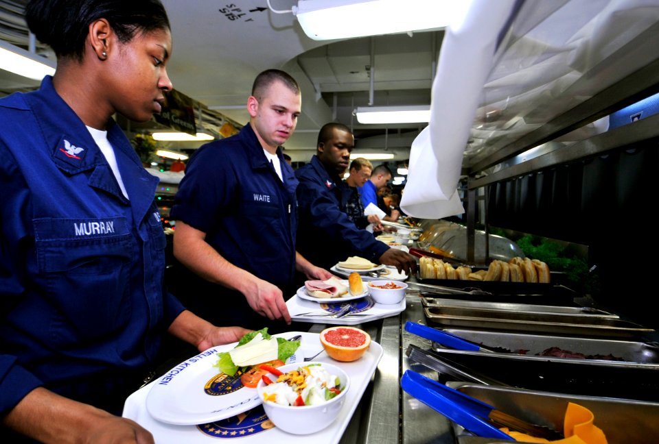 US Navy 091205-N-6003P-281 Sailors choose lunch on the mess decks of the Nimitz-class aircraft carrier USS Harry S. Truman (CVN 75)