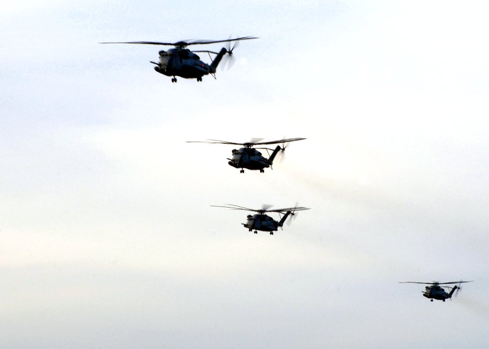 US Navy 091204-N-8655E-155 A group of CH-53E Super Stallions, assigned to Marine Medium Tiltrotor Squadron (VMM) 263 (Reinforced), transport Marines and equipment from the 22nd Marine Expeditionary Unit (22nd MEU)