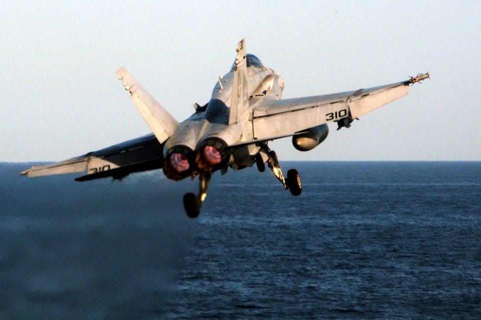 US Navy 091207-N-3038W-257 An F-A-18C Hornet assigned to the Warhawks of Strike Fighter Squadron (VFA) 97 launches from the aircraft carrier USS Nimitz (CVN 68)