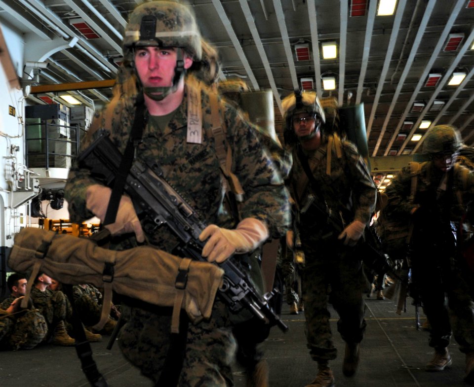 US Navy 091204-N-9740S-016 Marines assigned to the 22nd Marine Expeditionary Unit prepare to depart the amphibious assault ship USS Bataan (LHD 5)