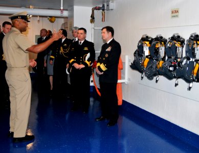 US Navy 091204-N-8848T-790 Chief Boatswain's Mate Donald Walker explains a fire fighting station aboard simulator USS Trayer (BST 21)