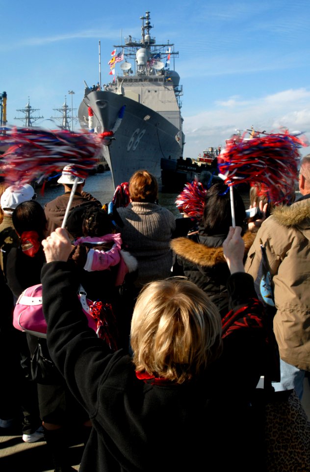 US Navy 091204-N-2456S-042 Friends and family members welcome home the crew of the Ticonderoga-class guided-missile cruiser USS Anzio (CG 68) at Naval Station Norfolk