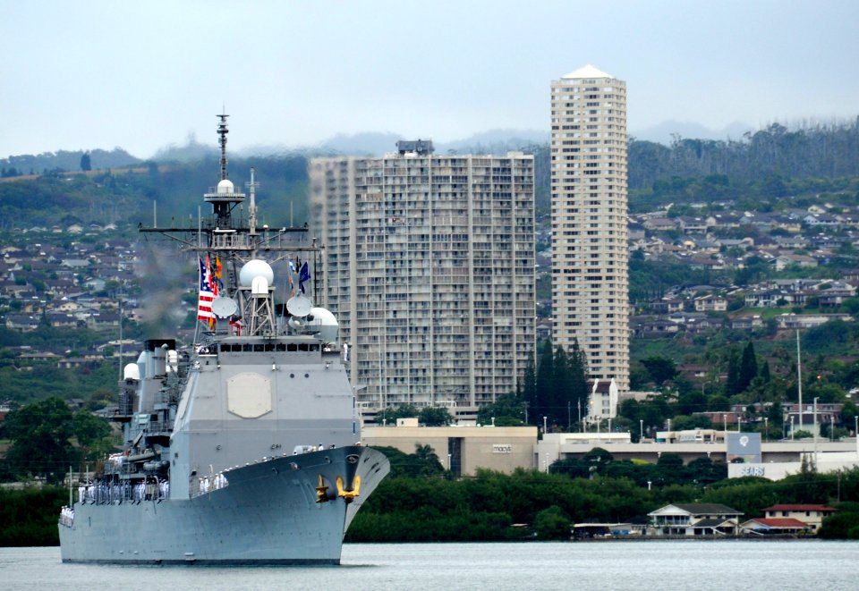US Navy 091207-N-7498L-241 The guided-missile cruiser USS Lake Erie (CG 70) prepares to render honors to the Arizona Memorial during the Pearl Harbor day commemoration
