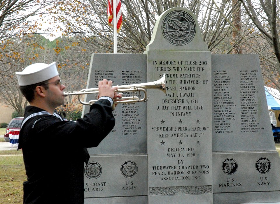 US Navy 091207-N-0000X-002 A bugler plays taps during a Pearl Harbor Remembrance Ceremony at Joint Expeditionary Base Little Creek-Fort Story