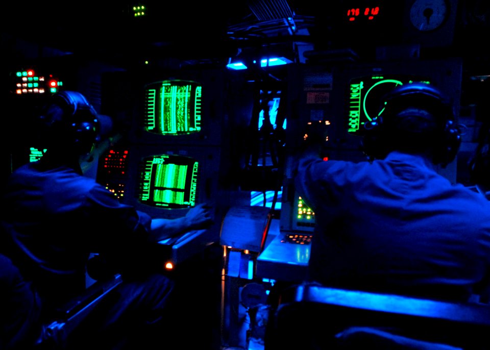 US Navy 091208-N-5812W-005 Sonar Technicians aboard the guided-missile destroyer USS The Sullivans (DDG 68) monitor sonar equipment