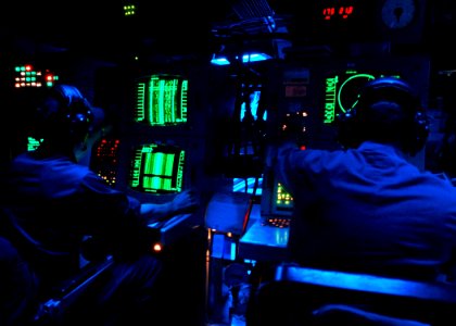 US Navy 091208-N-5812W-005 Sonar Technicians aboard the guided-missile destroyer USS The Sullivans (DDG 68) monitor sonar equipment